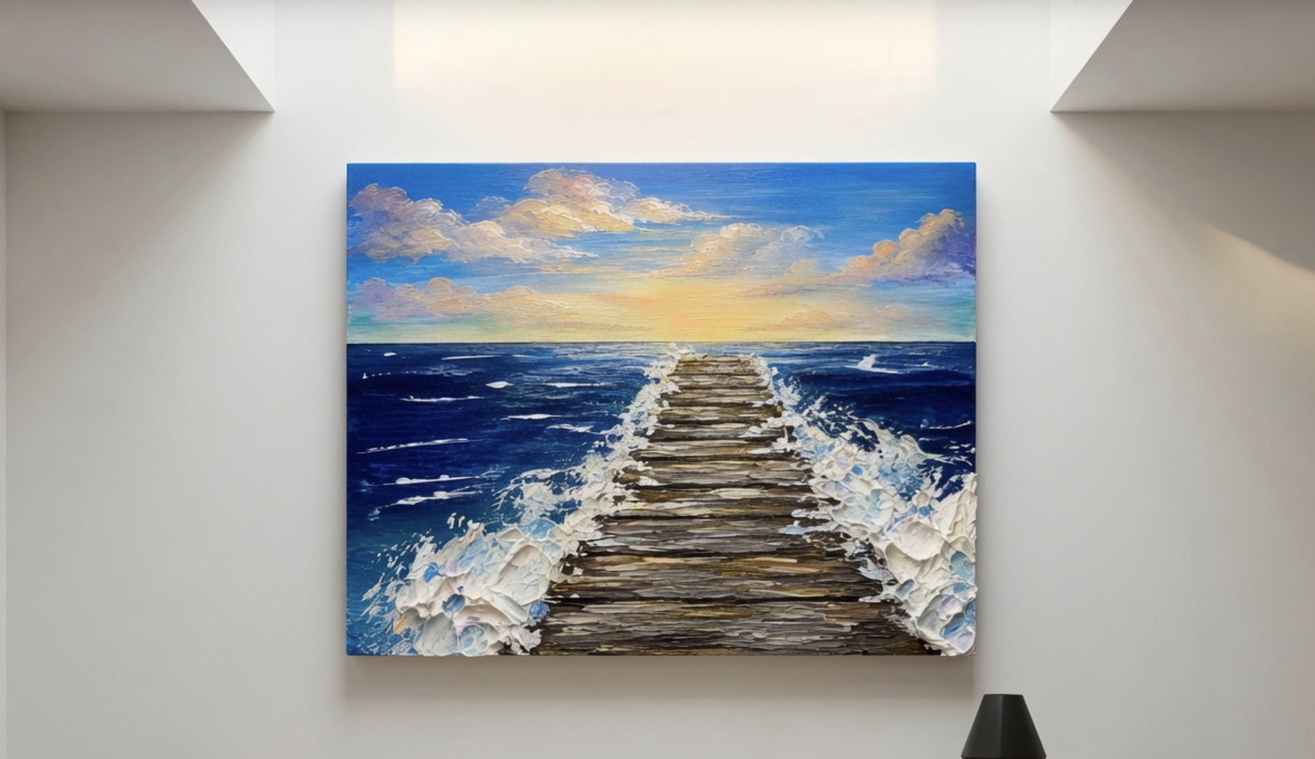 Wooden pier extending into ocean with blue sky and sunset